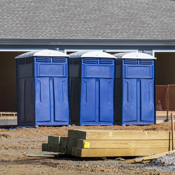 how often are the portable restrooms cleaned and serviced during a rental period in Madison GA